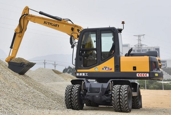 Why are excavators often arm drop